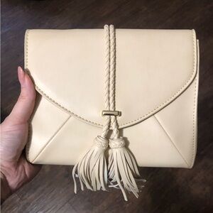 Moda Luxe Cream Clutch with Tassel Detail